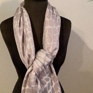 New with tags. Metallic silver pashmina. 26 by 75